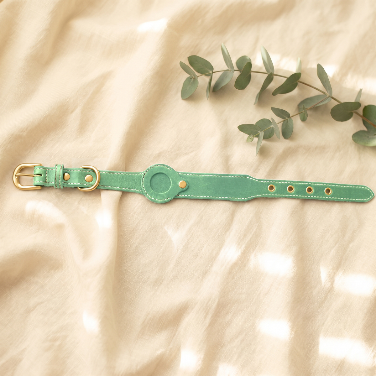 Green Furmonogram leather dog collar on cream linen